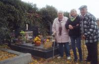 With daughter at the family grave