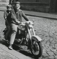 On a motorcycle with his younger brother Jaroslav