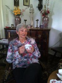 Zsuzsanna Gyenes in her living-room in 2013