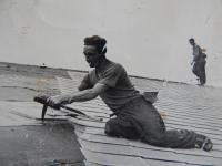 V.B. as a roofer