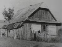 20 - wooden cottage on farm land