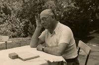 David Fischer reading in the garden