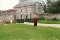 Františka Lukášová standing in front of the house of monsieur Grou during her visiting of Paissy in 2000.