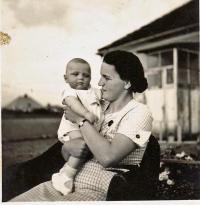 Mother holding me, on the roof of our factory in Kojetice, 1936
