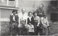 His mother Eva Soudská (in the middle) at the university, Jan Filip next to her