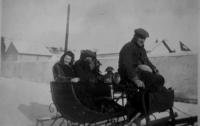 With her husband on the sledge