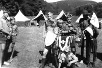 With caprured flags at the scout summer camp at the Manětín stream, summer 1969