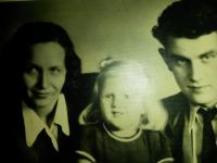 With her parents when she was five years old