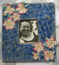 picture of Eva's mother in a frame made by Eva when young