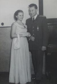 With her brother during the ball