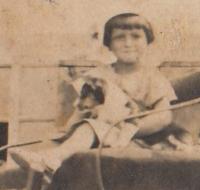 Little Helena with her dog named Oříšek