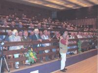 2004 (cca), ze setkání svazu PTP ve Městě Libavá, program v kulturním domě. Vojtěch SAsín sedí čtvrtý zleva.