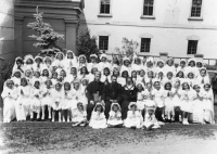 15- First Holy Communion - second row from the bottom, second girl on left