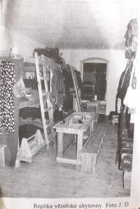 the picture of the replica of the prison dormitory