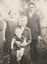 With his grandmother and parents, 1929