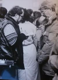 Interviewed by a journalist during the Velvet Revolution