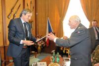 Colonel in retirement Pavel Vranský hands a book about czechoslovakian pilots who fought with the british R.A.F. to the Defence Secretary Martin Stropnický - The Ministry of Defence (2014)