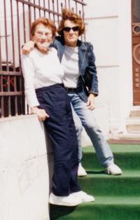 Brno, in front of former home with sister, cca 2000