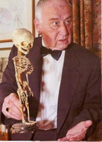Josef Koutecký with a skeleton of an infant