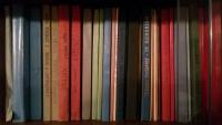 transcribed banned books in T. Dohnalová's bookcase
