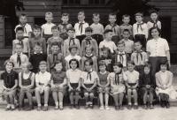 Tatjana in the third grade (fifth from the left in the bottom row), 1960