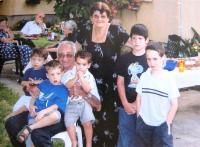 Judith, her husband and grandchildren