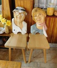 Carved chairs with portraits of František Palicka and his wife Anna