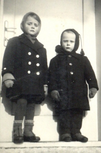Marie as a child - on the left