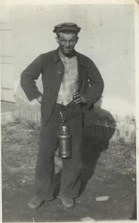 J. Sollár wearing mining dress