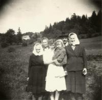 Alois and Therese Zatloukalovi, Josef and Anna Stanzel and Anna Moštková with her daughter in the village of Urlich about 1956