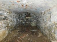 A covered cellar of one of the houses in the defunct settlement of Adamov