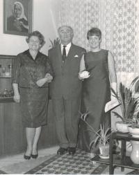Mina with her parents before her first ball