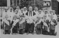 First holy communion in Raškov. Jan Skokan in the front row on the left