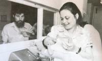 With her husband Yehoshua and their newborn child (1973)