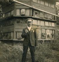 František Horn in front of bee house