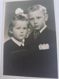 Whitness with his sister in childhood