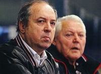 Milan Nový and Jan Havel while coaching a veteran's hockey team.
