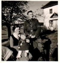 With mum and dad in financial guard uniform