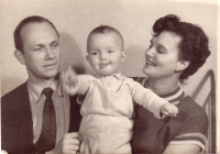 With his parents, 1956