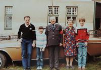 With his parents and daughter, 1980s