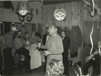 Bohumil Hrabal in the center of attention at the masquerade ball