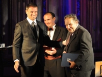 MUDr. Miloš Velemínský receiving the Golden Scale Award from Jiří Zimola, a regional council president, 2014 