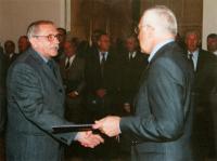 Karel Patak receives a prize for Lodenice from Vaclav Klaus